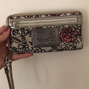 Coach Poppy Zip around wallet.